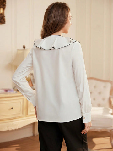 BIZwear Women's Elegant Contrast Color Frilled Pearl Buttoned Shirt With Rolled Edges