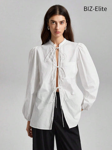 BIZwear Women's Solid Color Lantern Sleeve Lace-up Shirt