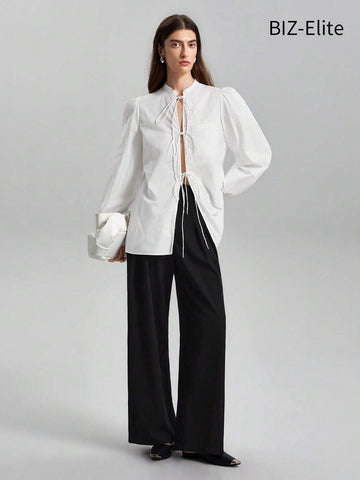 BIZwear Women's Solid Color Lantern Sleeve Lace-up Shirt