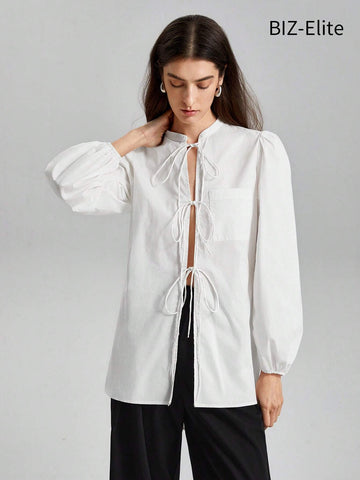BIZwear Women's Solid Color Lantern Sleeve Lace-up Shirt