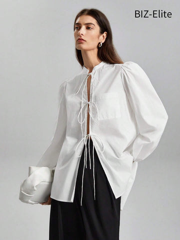 BIZwear Women's Solid Color Lantern Sleeve Lace-up Shirt