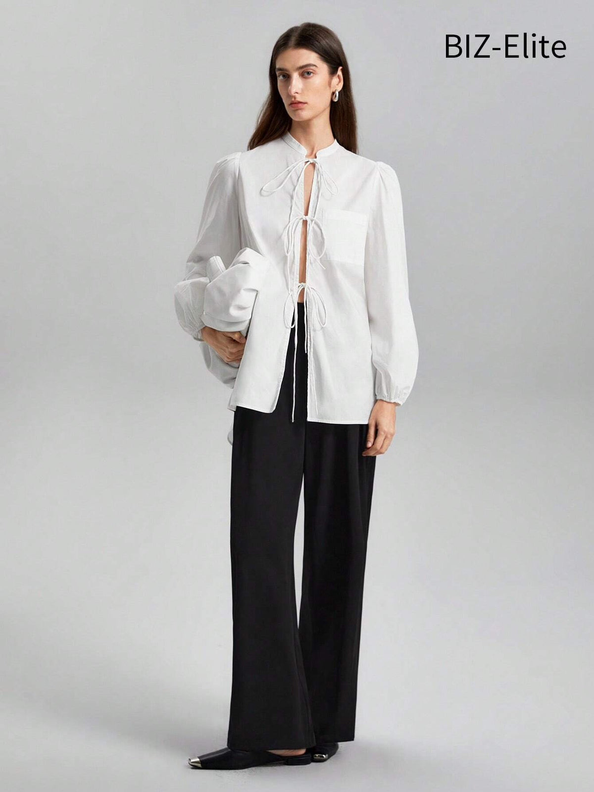 BIZwear Women's Solid Color Lantern Sleeve Lace-up Shirt