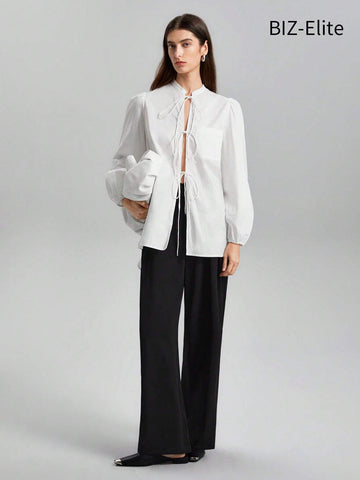 BIZwear Women's Solid Color Lantern Sleeve Lace-up Shirt