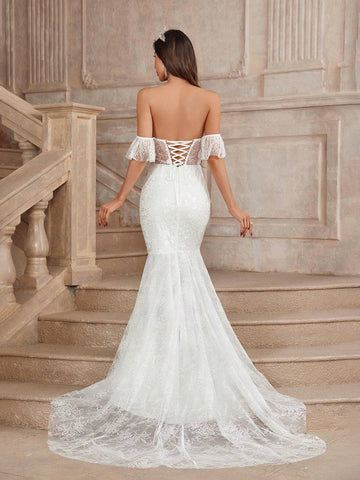 Is An Elegant, Gorgeous And Sexy Strapless Dress, With Off-Shoulder Ruffle Sleeves,  Fishnet Tulle Lace Mermaid Skirt Paired With A Long Train Wedding Dress