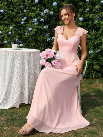 Elegant And Romantic Maid Of Honor Dress In Orange Pink Chiffon, With Sweetheart Neckline, Ruffle Trim Sleeves, Backless Design With V-Neck And Tie Strings, And Layered Ruffles Skirt