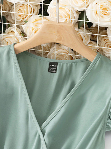 Women'S Solid Color Short Flutter Sleeve Jumpsuit With Pleated Hem