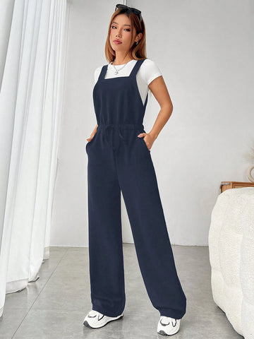 1pc Women's Solid Color Belted Casual Pocket Jumpsuit With Suspender Design