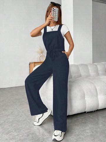 1pc Women's Solid Color Belted Casual Pocket Jumpsuit With Suspender Design