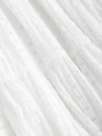 Textured Sleeveless Dress With Ruffled Hem