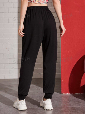 EZwear Tie Waist Pocket Patched Pants