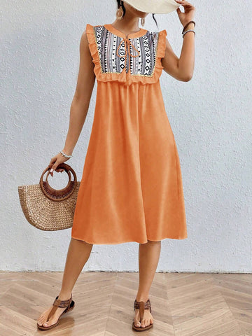 Geometric Printed Sleeveless Dress With Ruffle Hem And Embellished Trim