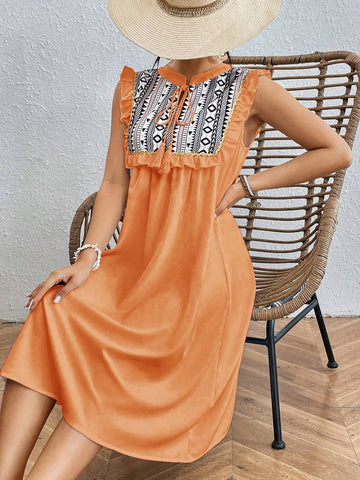 Geometric Printed Sleeveless Dress With Ruffle Hem And Embellished Trim
