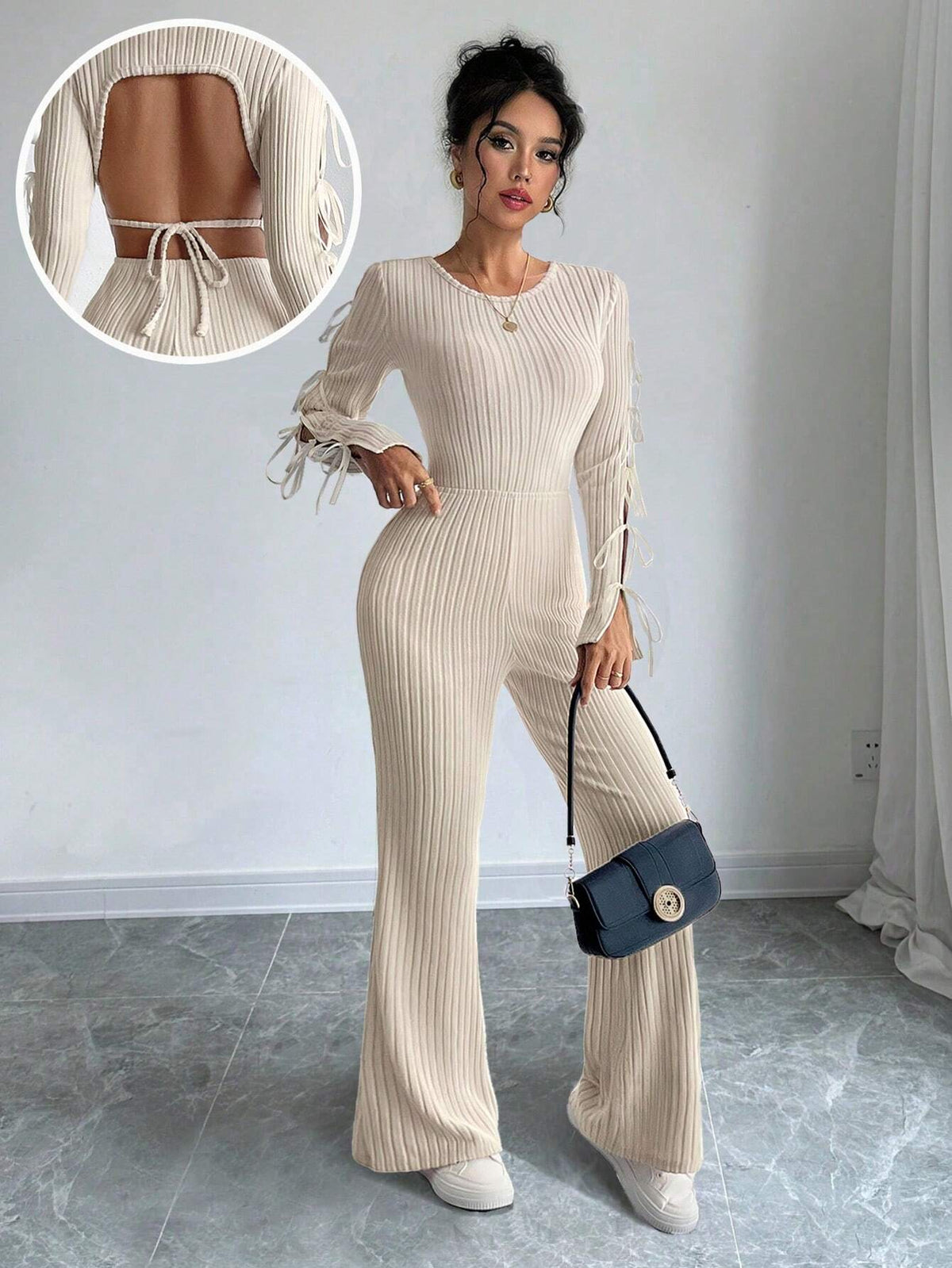 Retro Cut-Out Round Neck Long Sleeve Knitted Jumpsuit With Bow Tie Detail And Slim Fit Design