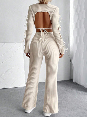 Retro Cut-Out Round Neck Long Sleeve Knitted Jumpsuit With Bow Tie Detail And Slim Fit Design