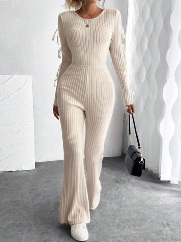 Retro Cut-Out Round Neck Long Sleeve Knitted Jumpsuit With Bow Tie Detail And Slim Fit Design