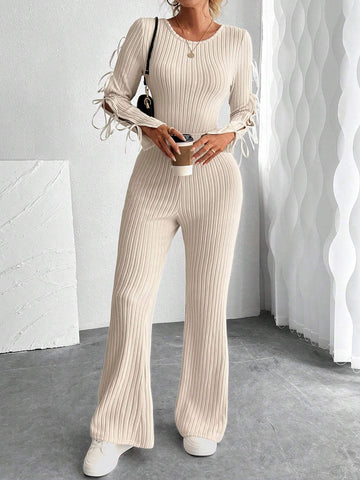 Retro Cut-Out Round Neck Long Sleeve Knitted Jumpsuit With Bow Tie Detail And Slim Fit Design