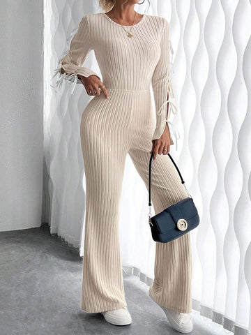 Retro Cut-Out Round Neck Long Sleeve Knitted Jumpsuit With Bow Tie Detail And Slim Fit Design