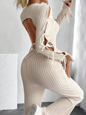 Retro Cut-Out Round Neck Long Sleeve Knitted Jumpsuit With Bow Tie Detail And Slim Fit Design