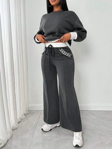 Women Contrast Color Casual Backless Long Sleeve Top And Knotted Long Pants Suit