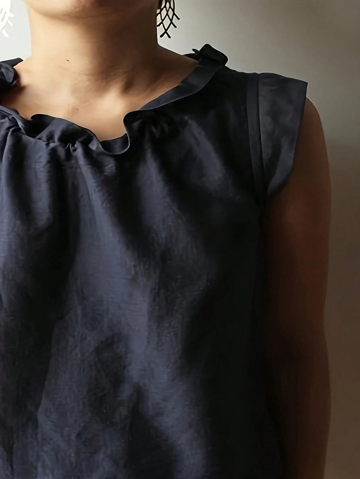Essnce Women Elegant Sleeveless Blouse With Ruffled Collar