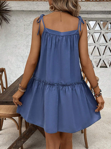 Summer Casual Loose Fit Spaghetti Strap Dress With Ruffled Trim, Decorative Tie, And Strappy Detailing