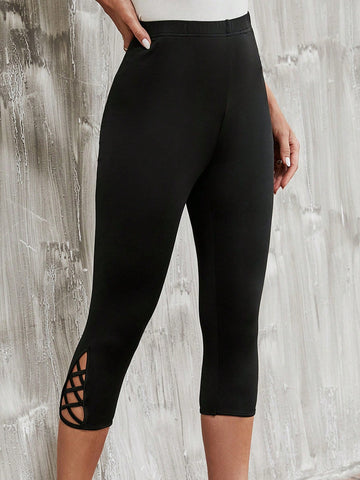 LUNE Criss Cross Hem Capri Leggings