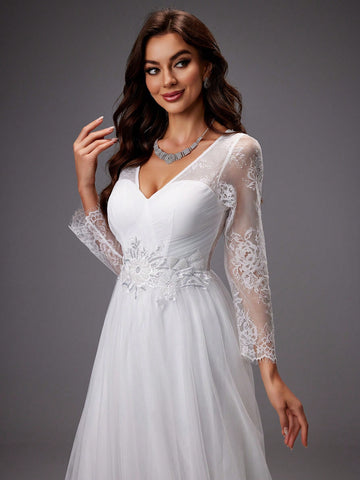 Long-Sleeved Lace Patchwork Embroidered Net Yarn Wedding Dress With Waist Sequin Detail