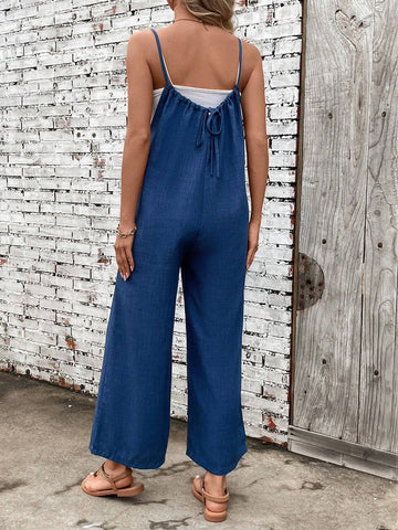 Solid Color Spaghetti Strap Jumpsuit With Slanted Pockets For Vacations And Leisure