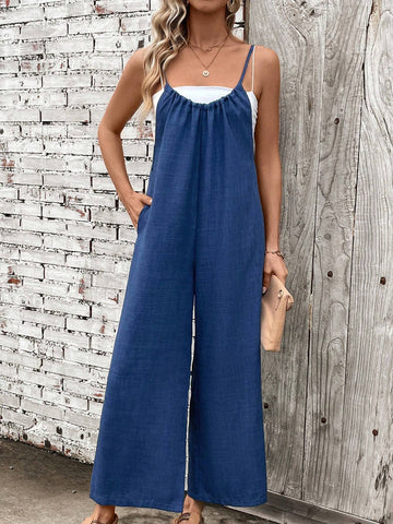 Solid Color Spaghetti Strap Jumpsuit With Slanted Pockets For Vacations And Leisure