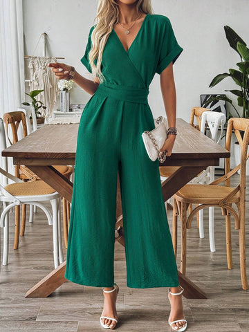 Spring And Summer Elegant Vacation Jumpsuit With Crossed Collar, Gathered Waist And Wide Leg Cut In Textured Fabric