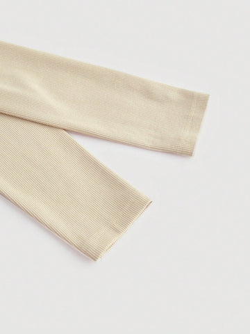 Solid Asymmetrical Neck Ribbed Knit Tee