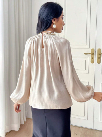 Modely Women's Solid Colored Lantern Sleeve Shirt With Chain Decoration