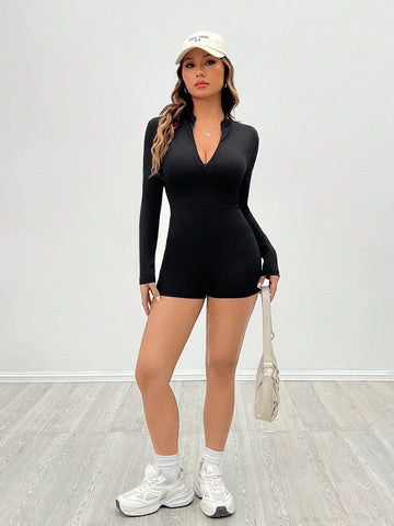 Casual Black Ribbed Long-Sleeve Zip-Front Bodysuit