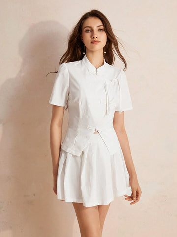 Elegant Set Of Chinese-Style Short-Sleeved Shirt With Asymmetric Buckle And V-Shaped Hem, And Skirt In Solid Color
