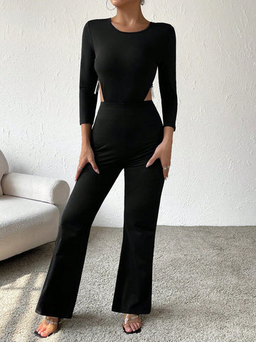 Rhinestone Fringe Trim Cut Out Back Flare Leg Jumpsuit