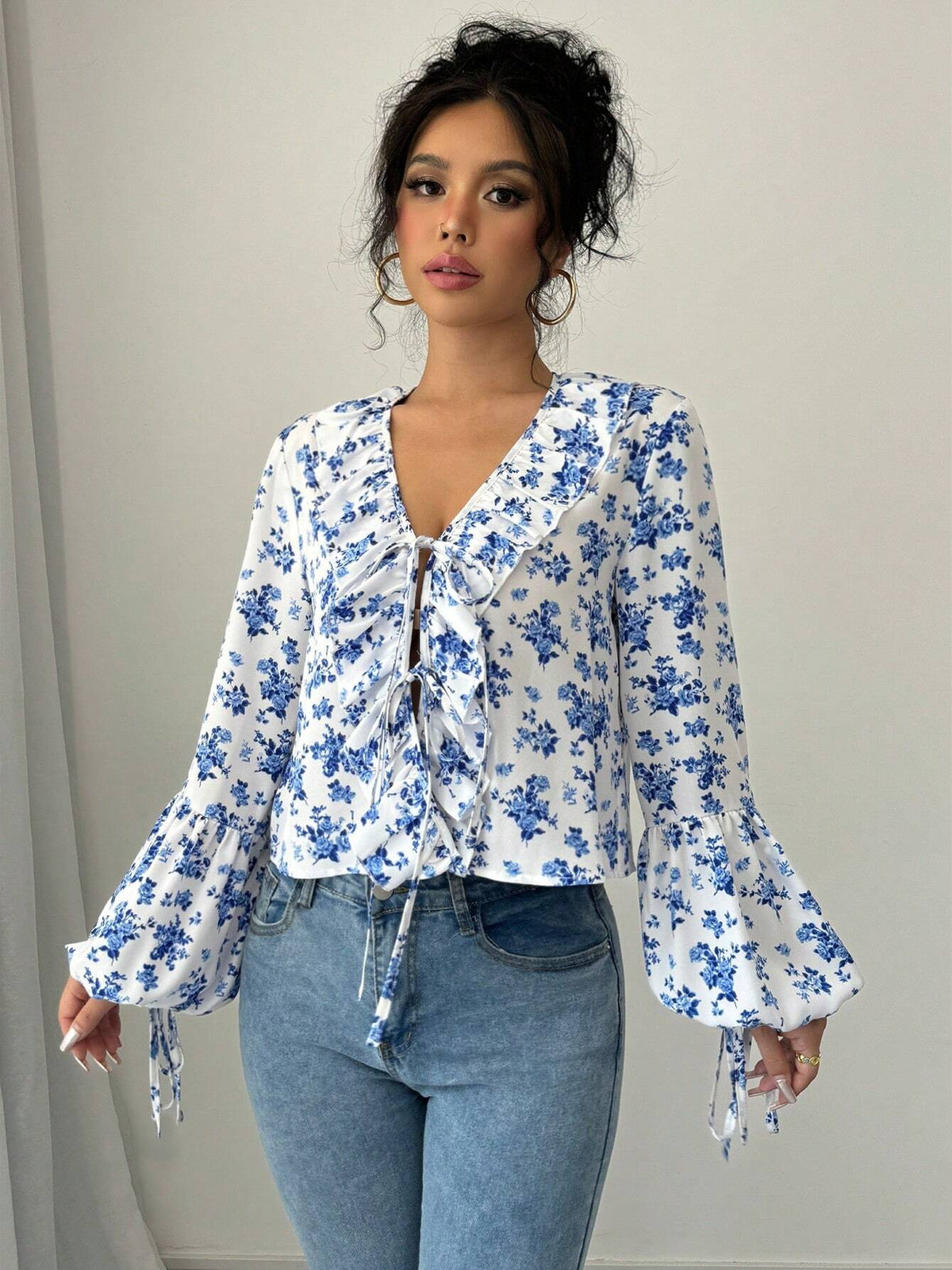 Privé V-Neck Ruffled Twist Floral Print Casual Resort Long Sleeve Blouse