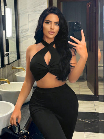 Hollow Out Crop Top & Pleated Pants Hanging Neck Two Piece Set
