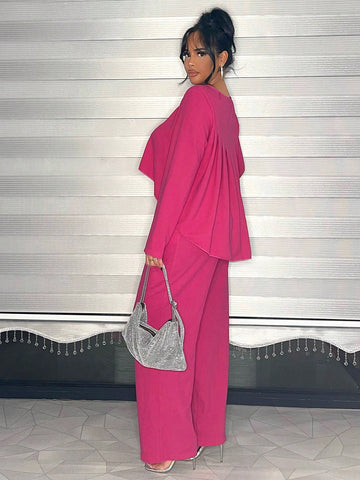 Solid Colored Top With High-Low Hemline And Pink Pants With Slanted Pockets Set