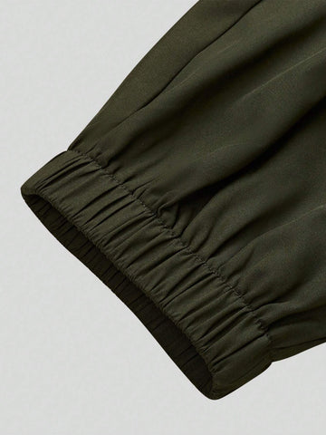 Solid Color Strapless Jumpsuit With Gathered Waist And Ankle Cuffs