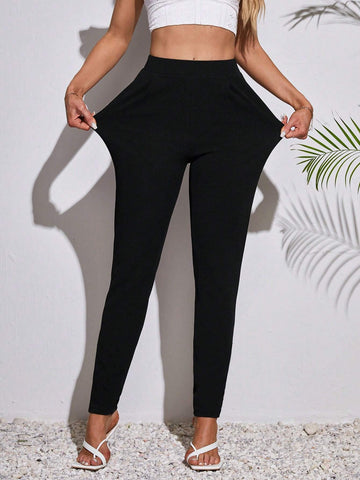 Tall Women's High-Waisted Black Pants With Pleats And Tight Fit Pockets