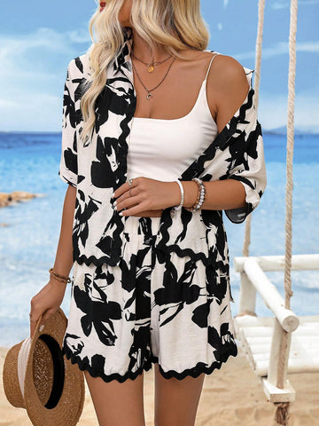 Casual Loose Fit Button-Front Shirt With Wave Lace High-Low Hem And All-Over Printed Pattern, Featuring Short Sleeves And Stand Collar, Paired With Shorts