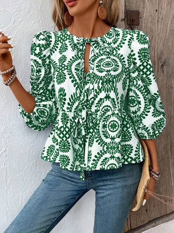 VCAY Front Tie Neck All-Over Print Ruffle Hem Blouse