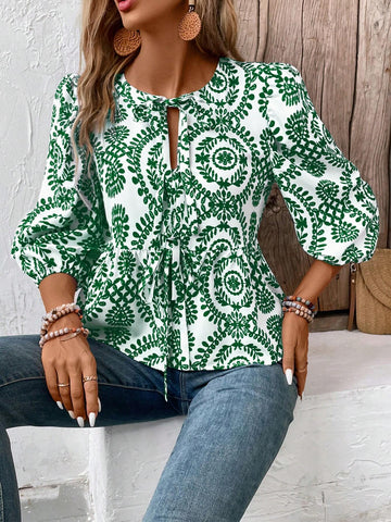 VCAY Front Tie Neck All-Over Print Ruffle Hem Blouse