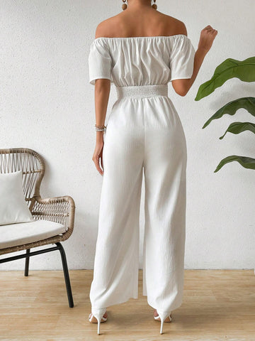 Women Fashionable White Jumpsuit With Off Shoulder Neckline And Waist Tie For Slim Fit