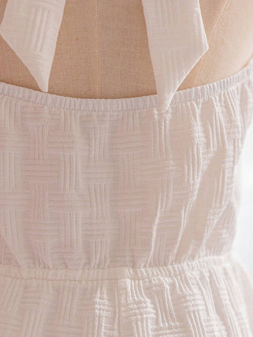 White Textured Material Basic Jumpsuit With Front/Mid V-Neck And Back/Mid Tie Straps