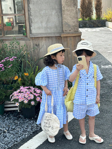 Young Girl Summer Round Neck Short Puff Sleeve Grid Dress With Ruffle Hem, Perfect For Summer Holidays And Back To School