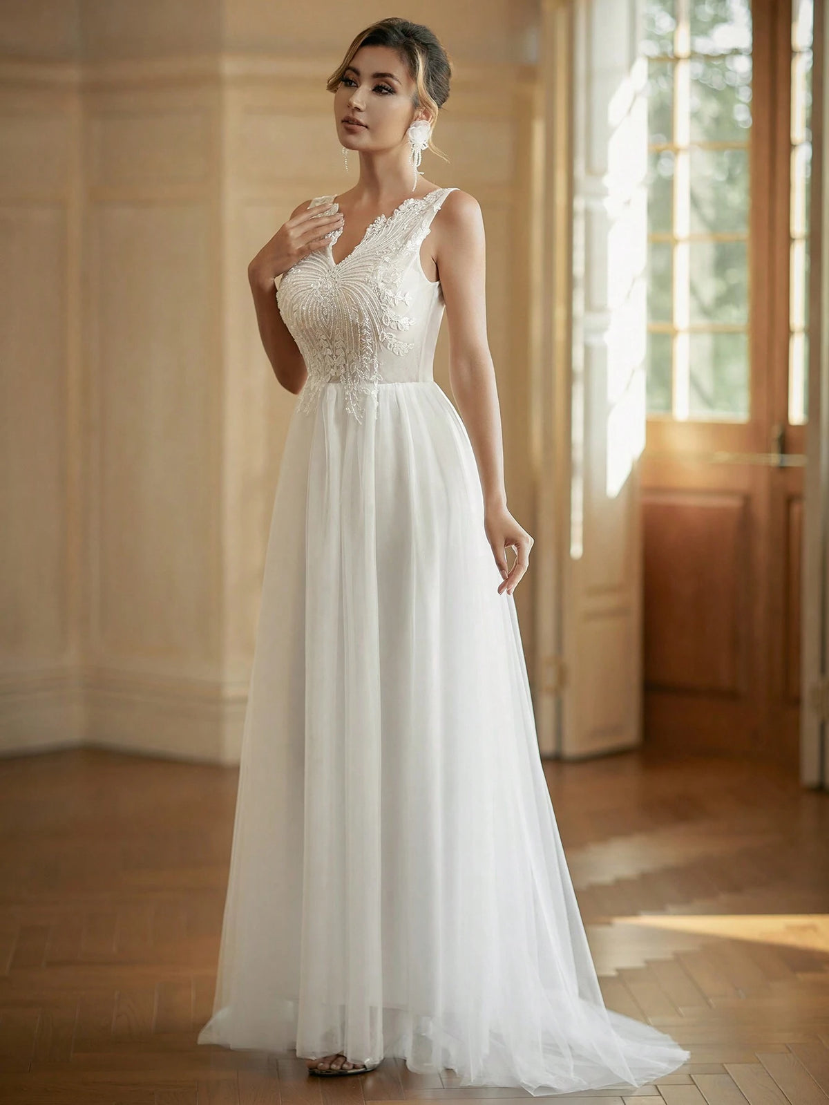 V-Neck Embroidered Tulle Wedding Dress With Sparkly Sequin Details In Contrasting Colors