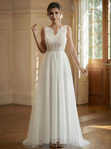 V-Neck Embroidered Tulle Wedding Dress With Sparkly Sequin Details In Contrasting Colors