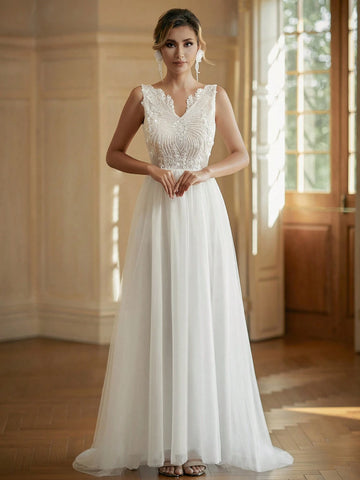 V-Neck Embroidered Tulle Wedding Dress With Sparkly Sequin Details In Contrasting Colors
