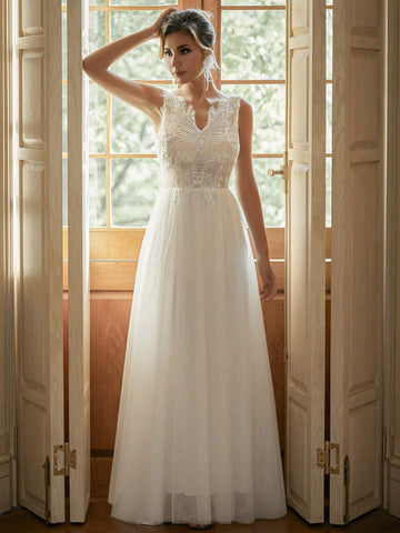 V-Neck Embroidered Tulle Wedding Dress With Sparkly Sequin Details In Contrasting Colors